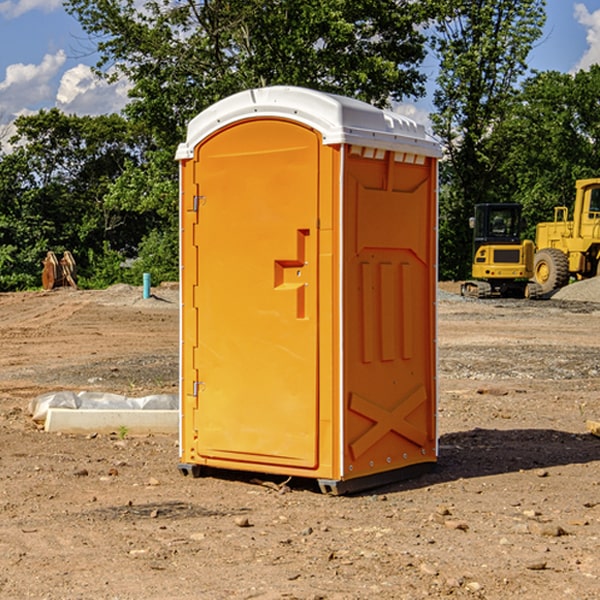 what is the cost difference between standard and deluxe portable restroom rentals in Minter City